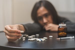 Anti,Drugs,,Drug,Addict,Asian,Young,Woman,Hand,Holding,Pills,