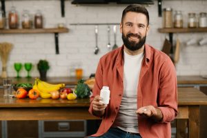 man taking meloxicam pill